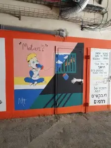 סיור גרפיטי בעקבות ה 7.10 בחיפה