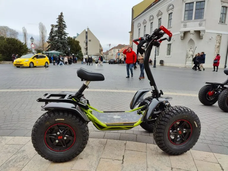An electric EZRaider vehicle in the square of the Castle District in Budapest